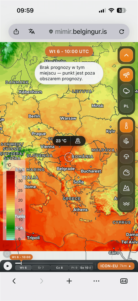 Ekran telefonu z mapą, celownikiem i ikoną lokalizacji